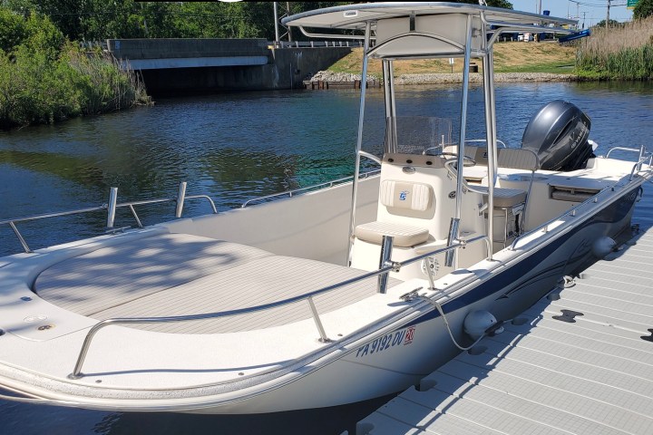 a group of people on a boat in the water